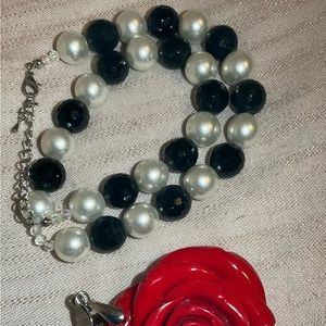 Necklace with clip on rose